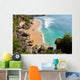 beautiful beach where people are surfing in water Wall Mural