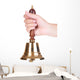 Gold retro school bell in hand isolated on white Wall Decal