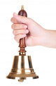 Gold retro school bell in hand isolated on white Wall Decal