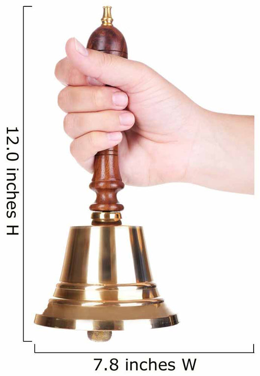 Gold retro school bell in hand isolated on white Wall Decal