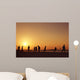 Football at  beach in Dubai during sunset. Wall Mural