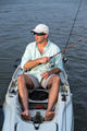 Man Fishing in Kayak Wall Mural