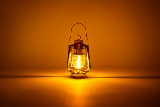 Burning Kerosene Lamp Concept
