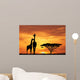 baby giraffe silhouette at sunset Wall Mural