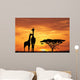 baby giraffe silhouette at sunset Wall Mural
