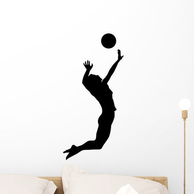 Jumping Volleyball Wall Decal shown on a wall