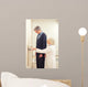 General practitioner measuring male patient's height in hospital Wall Mural