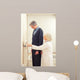 General practitioner measuring male patient's height in hospital Wall Mural