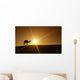 Silhouette of a camel walking alone in the Dubai desert Wall Mural