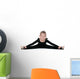 Pretty little girl performs gymnastic exercise Wall Decal