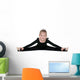 Pretty little girl performs gymnastic exercise Wall Decal