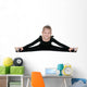 Pretty little girl performs gymnastic exercise Wall Decal