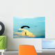 unidentified skydiver, parachutist on blue sky Wall Mural