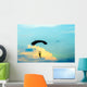 unidentified skydiver, parachutist on blue sky Wall Mural