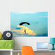 unidentified skydiver, parachutist on blue sky Wall Mural