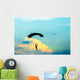 unidentified skydiver, parachutist on blue sky Wall Mural
