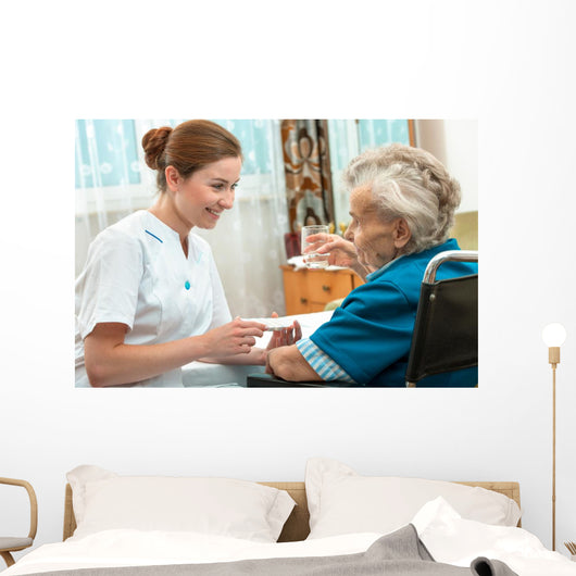 Female Nurse Giving Senior Wall Decal