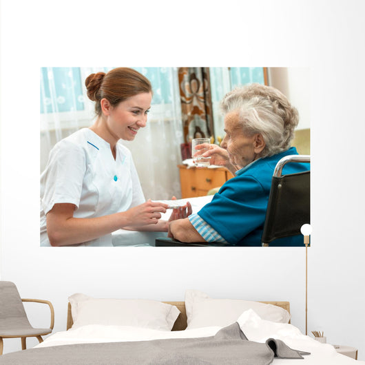 Female Nurse Giving Senior Wall Decal