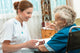 Female Nurse Giving Senior Wall Decal