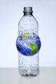 Plastic Water Bottle With Earth Inside Wall Mural