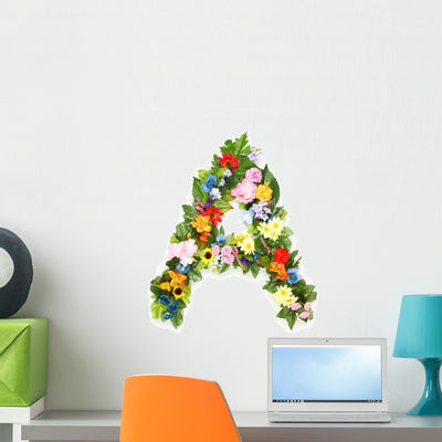 Floral Arrangement Letter Wall Decal shown on a wall