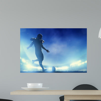 American Football Player Kicking shown on a wall