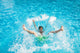 Man falling and splashing into water Wall Mural