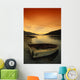 Old Rowboat At Water's Edge With Sunset Background Wall Mural