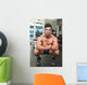 Shirtless Muscular Man Flexing Muscles in Gym Wall Mural