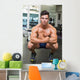 Shirtless Muscular Man Flexing Muscles in Gym Wall Mural