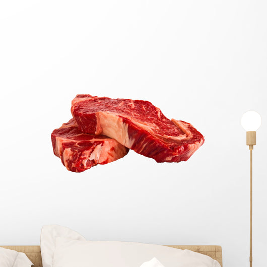 Ribeye steaks isolated on white background Wall Decal
