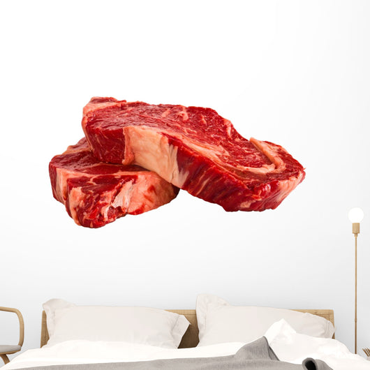 Ribeye steaks isolated on white background Wall Decal
