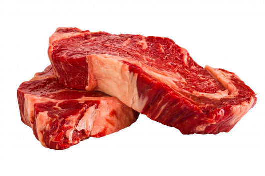 Ribeye steaks isolated on white background Wall Decal