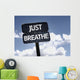 Just Breathe sign with clouds and sky background Wall Mural