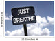 Just Breathe sign with clouds and sky background Wall Mural