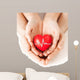 Hands Holding Heart with
