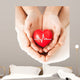 Hands Holding Heart with