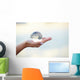 Crystal ball on hand Wall Mural