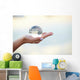 Crystal ball on hand Wall Mural