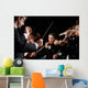 Conductor directing symphony orchestra Wall Mural