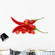 red chilly peppers with slices isolated on the white background Wall Decal