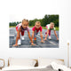 girls starting to run on track Wall Mural