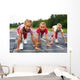 girls starting to run on track Wall Mural