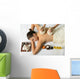 portrait of young beautiful woman in spa environment, massage wi Wall Mural