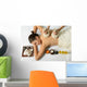 portrait of young beautiful woman in spa environment, massage wi Wall Mural