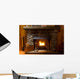 close-up of stone fireplace in log cabin with blazing fire Wall Mural