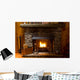 close-up of stone fireplace in log cabin with blazing fire Wall Mural