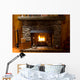 close-up of stone fireplace in log cabin with blazing fire Wall Mural