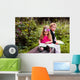 Little preschooler kid reading outdoor Wall Mural