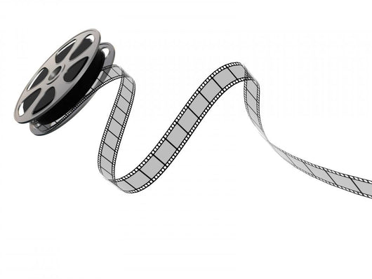 Film reel and strip on a white background Wall Decal